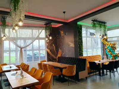 a dining room with tables and chairs and windows at Small cute doublebed room A4 in Pančevo in Pančevo