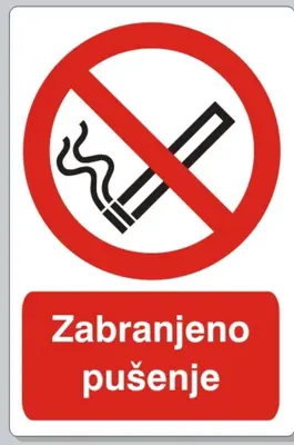 a sign with a no smoking sign at Apartman Provance in Batajnica