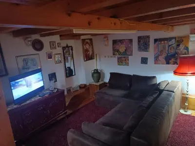 a living room with a couch and a flat screen tv at Maravilja in Filmski Grad