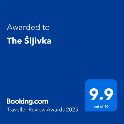 a blue text box with the text awarded to the skylka traveller review awards at The Šljivka in Belgrade