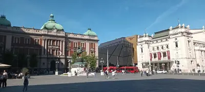 a city square with buildings and people walking around at Authentic Belgrade Centre Apartments for large groups, Republic Square - Up to 47 People in 5 Apartments in Belgrade
