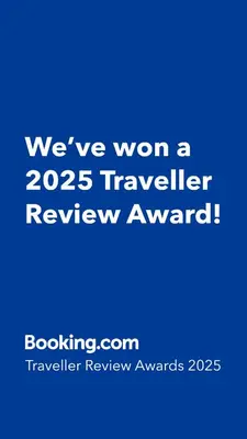 a blue sign that says weve won a traveler review award at Mansarda, Belgrade in Belgrade