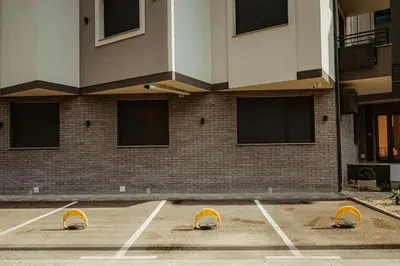 a parking lot in front of a building at TOP VIEW apartment 46 in Arandjelovac