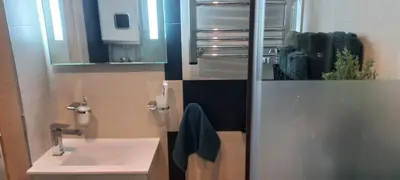 a bathroom with a sink and a mirror at Perfect place to stay in Belgrade