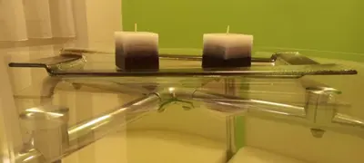 a glass table with two candles on top of it at Perfect place to stay in Belgrade