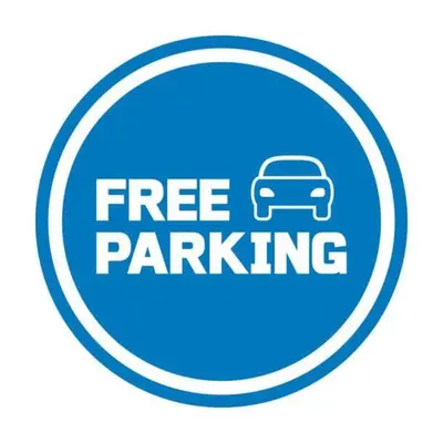 a free parking sign with a car in a circle at Apartman Tara1 in Belgrade