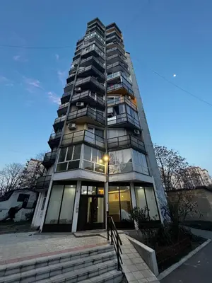 a tall building with a light at the top of it at A tiny single room - Macchiato in Belgrade