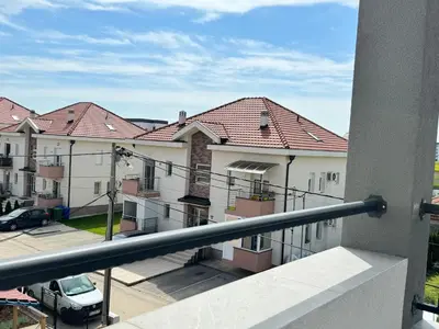 a view of a building from a balcony at Deluxe Belgrade Airport Single Room in Surčin