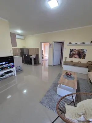 a living room with a couch and a table at Rio Apartmani Ub 2 in Ub