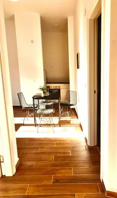 a dining room with a table and chairs at Amar2 in Belgrade