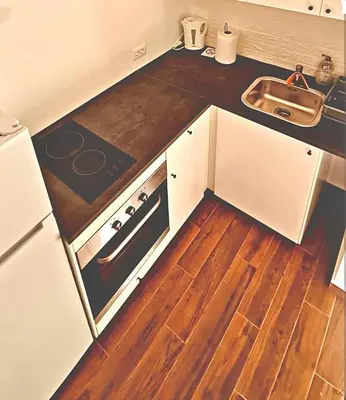 a kitchen with a sink and a stove at Amar2 in Belgrade