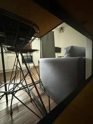 a view of a room with a couch and a chair at Amar 3 in Belgrade