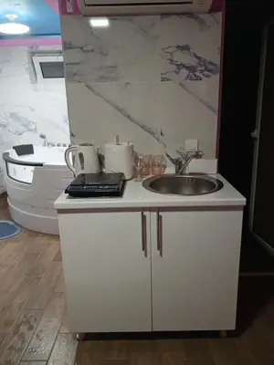 a kitchen with a sink and a counter top at Stan Na Dan Pancevo in Pančevo
