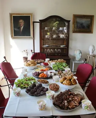 a table with many different types of food on it at ART HOUSE Kosmaj 1 in Sopot