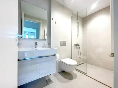 a white bathroom with a sink and a toilet at Metropoliten - Aria Lux Apartments BW in Belgrade