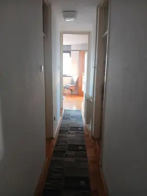 a hallway of a room with a hallwayngthngthngthngthngthngthngthngth at Bezanija86 in Belgrade