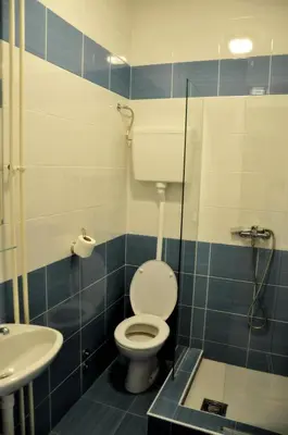 a bathroom with a toilet and a sink at Rooms Karadjordje in Belgrade