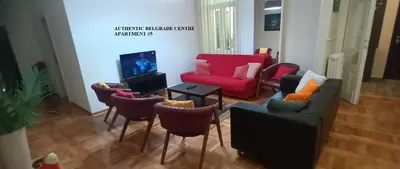 a living room with a couch and chairs and a tv at Authentic Belgrade Centre Apartment #5, Four bedrooms, One Full Bathroom, One Toilet in Belgrade