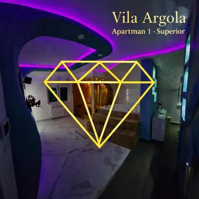 a room with a purple and yellow neon sign at Vila Argola - Spa Luxury Apartments in Belgrade