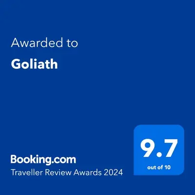 a blue phone screen with the text awarded to goldenith at Goliath in Belgrade