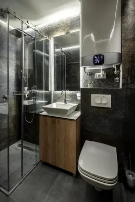 a bathroom with a toilet and a sink and a shower at Belly3 in Belgrade