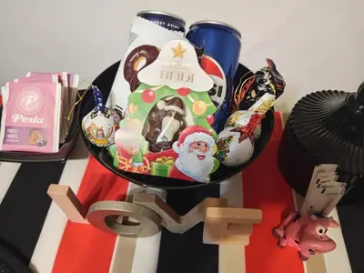 a plate of christmas food on a table at Apartman EN in Dušanovac (historical)