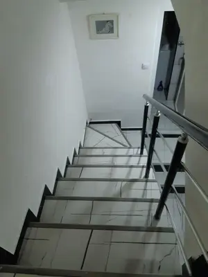 a stairway in a building with a stair case at Viktoria in Belgrade