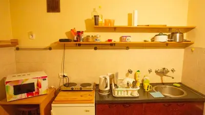 a kitchen with a sink and a counter top at Private cozy room 2 with shared kitchen in appartment in Belgrade