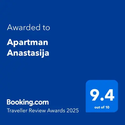 a blue text box with the words upgraded to austrian amistasia at Apartman Anastasija in Surčin