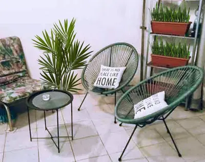 two chairs with a pillow that says you are a little home at Globetrotter's City Center Modern ᯤ in Belgrade