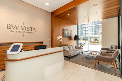 a lobby of a hotel with a reception desk at Modern Luxury in Belgrade Waterfront with Views in Belgrade