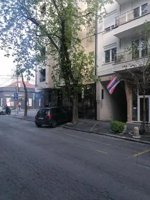a car parked on a street next to a building at Belgrade apartment Skadarlija in Belgrade