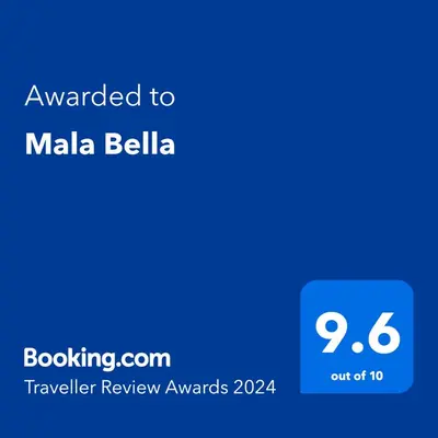 a screenshot of a cell phone with the text awarded to malala bellila at Mala Bella in Zemun