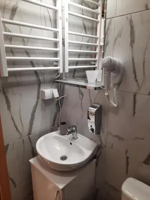 a bathroom with a sink and a mirror at Aleksa 2 in Belgrade
