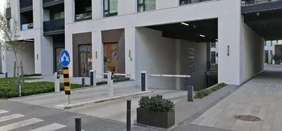 a building with a street sign in front of it at Belgrade Waterfront Nabucco in Belgrade